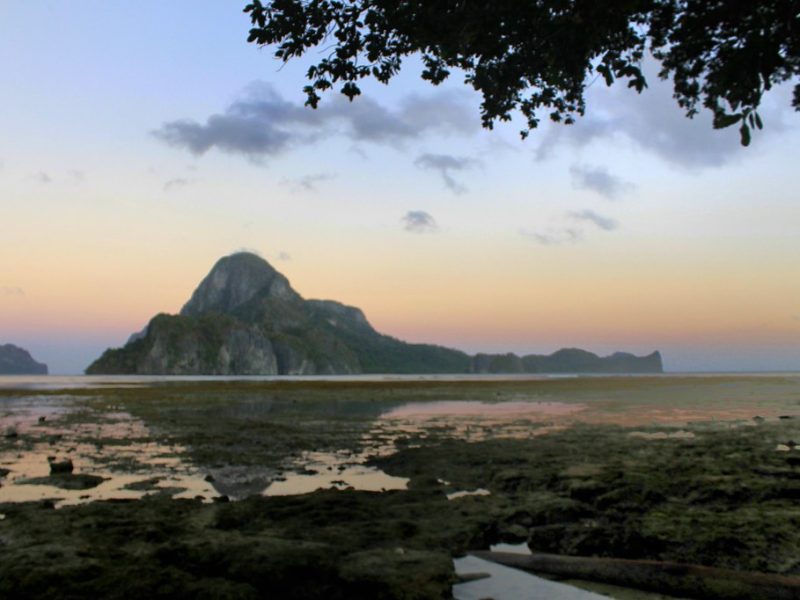 Limestone island and lagoon in turquoise water